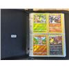 Image 1 : Lot of 1 Leather Binder with 140 Assorted Pokemon Cards
