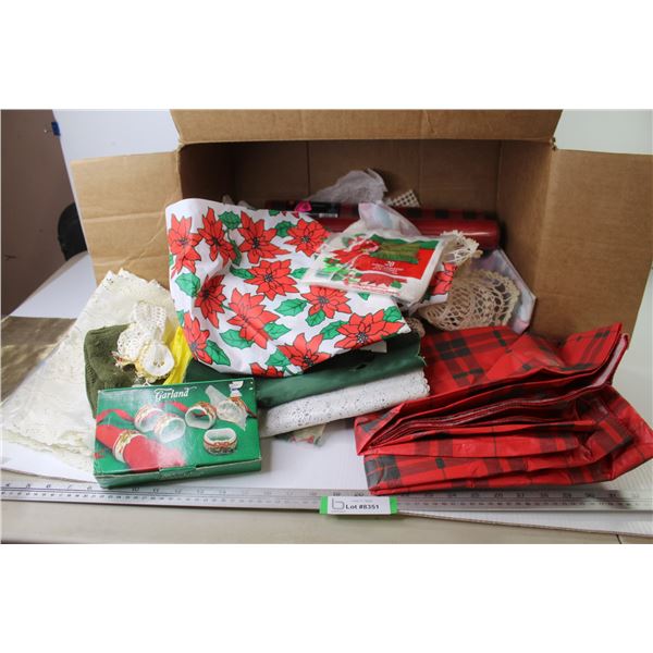 Assorted Christmas Items - Plastic Table Cloths - Table Runners - Napkin Holder - Napkins - Misc. It
