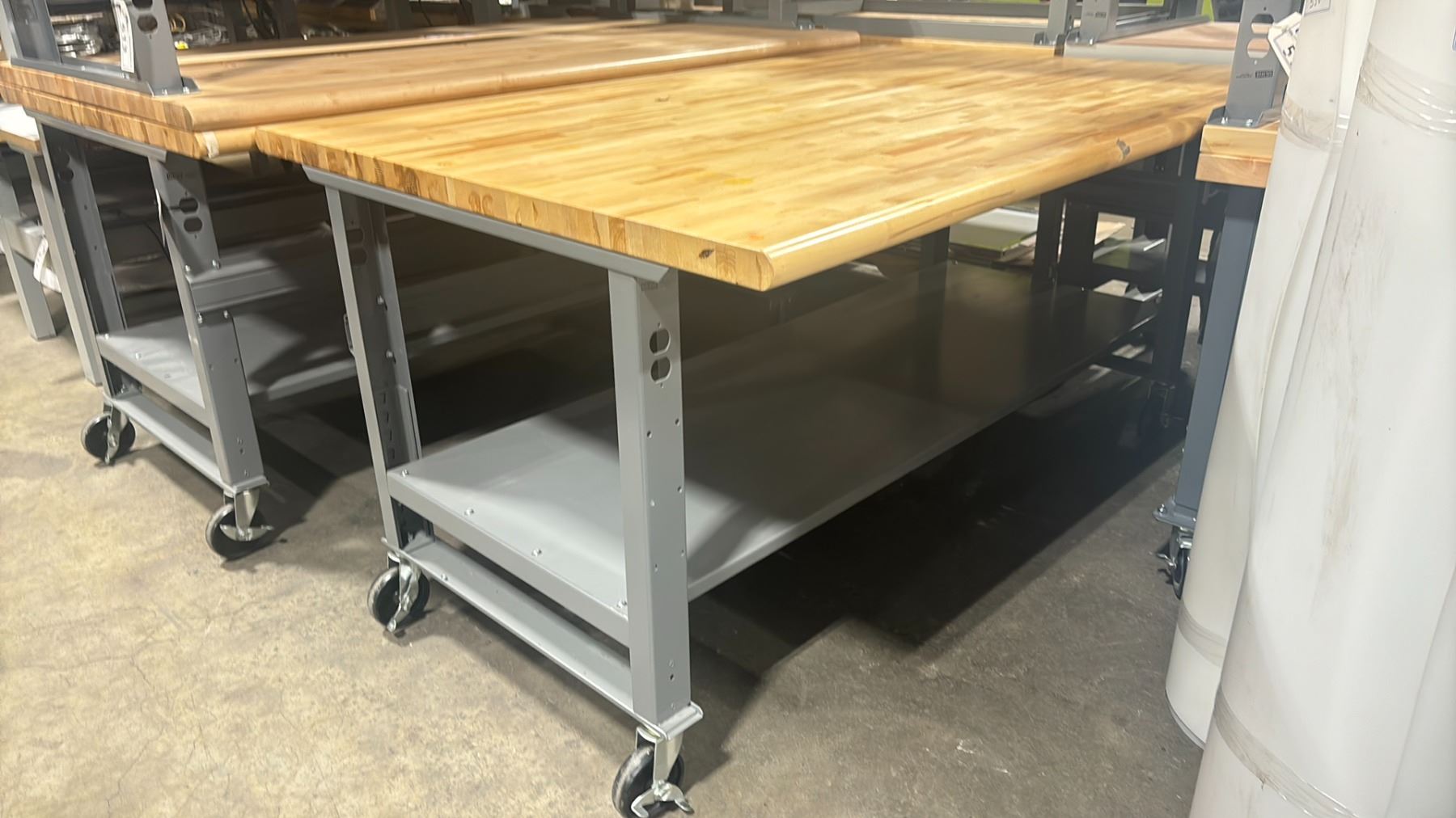 ULINE WOODEN/METAL HEIGHT ADJUSTABLE PACKING TABLE WITH POWER OUTLETS ...
