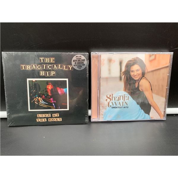 The Tragically Hip and Shania Twain CD's