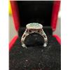 Image 2 : 1.85 CT ROUND CUT MOISSANITE SET IN CENTER OF STAMPED PLATED  SILVER RING WITH 54 ROUND CUT CUBIC ZI