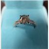 Image 1 : 2.00 CT ROUND CUT MOISSANITE WITH 2 TAPERED BAGUETTE CUT CUBIC ZIRCONIA WEIGHING 0.30 CT TW WITH 12 