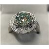 Image 1 : 2.10 CT ROUND CUT MOISSANITE WITH 42 ROUND CUT CUBIC ZIRCONIUM WEIGHING A TOTAL 0.40 CT SET IN STAMP