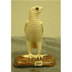 Ivory Predatory bird with salmon in talons mounted on fossilized ivory by A. Rookoki of Savoonga 5.7