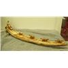 Image 4 : Dog team mounted on fossilized ivory tusk, dogs of bone, man of fossilized ivory, sled has ivory sea
