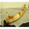 Image 5 : Dog team mounted on fossilized ivory tusk, dogs of bone, man of fossilized ivory, sled has ivory sea