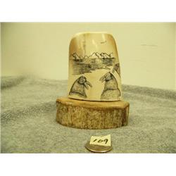 Ivory bark scrimshawed with walrus scene by E.P. 4.5" tall retail value $425.00 (33)