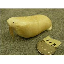 Old ivory carving of walrus with tusks of walrus whiskers 1.25" tall retail value $295.00 (33)