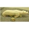 Image 4 : Carved ivory polar bear with inset baleen eyes and nose by H.B. Slwooko 1.75" tall 6.25" long (33)