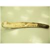 Image 1 : Relief carved whale bone with 2 whales 57.5" long (33)