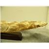 Image 4 : Carvings of school of fish on fossilized ivory tusk mounted on wood 50.5" long retail price $2200.00
