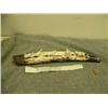 Image 1 : Old Ivory Walrus tusk mounted with 3 carved ivory seals being stalked by a crawling hunter, Savoonga