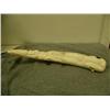Image 1 : Ivory tusk cribbage board made to look like a whale with relief carvings of walrus, bear, seals, and