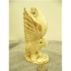Carved eagle with chipped wing tip on right by T. Grny 6" tall (159)