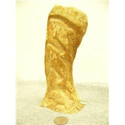 Relief carving on bone of man with ivory face and belugas 8.25" tall by Davis last name unreadable (