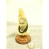 Image 1 : Whale tooth scrimshawed with a Eskimo man's face mounted on wood by H.S.K. 5.25" (33)
