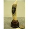 Image 1 : Whales tooth scrimshawed with Eskimo man's face mounted on wood 3 3/8 long by H.S.K. (33)