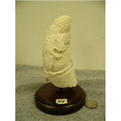 Whales tooth carved with polar bear preparing to swat a seal mounted on wood 6.5" tall (33)