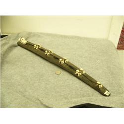 Dog team mounted on baleen - dogs, sled and men carved out of ivory 22.25" (33)