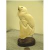 Image 1 : Carved walrus mounted on wood By Eddy Syzoc 7.5" tall retail value $2200.00 (33)