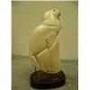 Image 5 : Carved walrus mounted on wood By Eddy Syzoc 7.5" tall retail value $2200.00 (33)