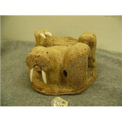 Bone carving of 4 walrus 2 with ivory tusks by H.B. Slwooko retail value $425.00 (33)