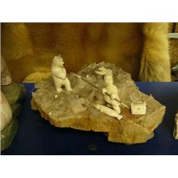 Metamorphic rock base with quartz crystals 17" long and 5 ivory figures: dog, bear 4.75", seal, bag 