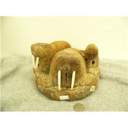 3 walruses carved from whale bone, 2 with ivory tusks, inset baleen eyes 5" tall retail value $595.0