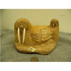 Bone carving of mother and baby walrus with inset baleen eyes and ivory tusks by H.B. Slwooko 4.75" 