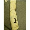 Image 6 : Carved tusk with man, spotted seal with pup, seal with pup, walrus with baby, 2 whales and polar bea