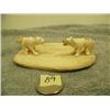 Image 1 : Carved ivory wolves on bone disk 1.25" tall 4.25" long by L.A.I. (33)