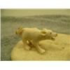 Image 2 : Carved ivory wolves on bone disk 1.25" tall 4.25" long by L.A.I. (33)