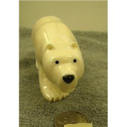 Carved polar bear with inset baleen eyes and nose by H.D. Slwooko 2.5" x 6" (33)