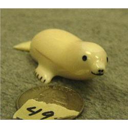 CHOICE on 3: ivory carvings - seal 3.75" tall by William Omyruk Iyapana  (33)