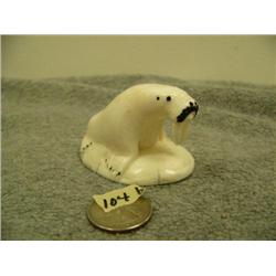CHOICE on 3: Ivory carvings - Walrus with ivory base 1 5/8" x 2.25 retail value $225.00 by L.O. of D