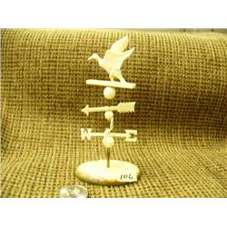 Small carved ivory wind vane with duck mounted on fossilized ivory- 5" (74)