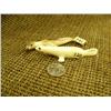 Image 1 : Lot of 2 seals: fossilized ivory by Arnold Iyakitan 4.25" long and white ivory seal by L. Apangalook