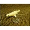 Image 2 : Lot of 2 seals: fossilized ivory by Arnold Iyakitan 4.25" long and white ivory seal by L. Apangalook