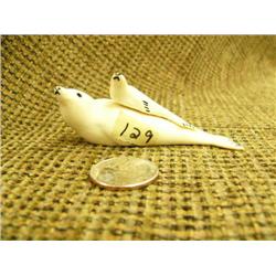 Carved ivory seal with baby seal on back by Arnold Iyakitan 3.25" (74)