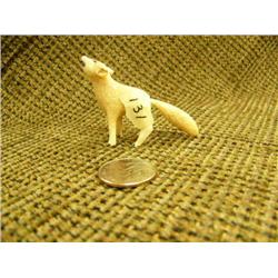 Fossilized ivory howling fox by T.K. 1.5" tall (74)