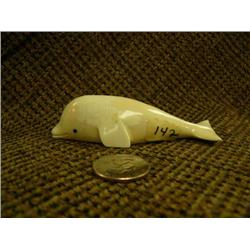 Ivory dolphin by Darrell Apatiki with inset baleen eyes 3.75" long (74)
