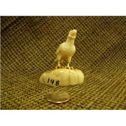 Ivory eagle mounted on fossilized ivory by Pete Kulik 1975 2.75" tall (74)