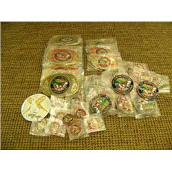 1987 Fur Rondy memorabilia: 6 men's belt buckles, 3 lady's belt buckles, 12 collectors pins, 9 tie t