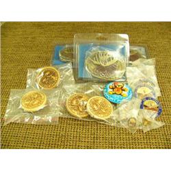 1993 Fur Rondy Memorabilia - 3 belt buckles, 4 tie tacks, 4 collector pins, 1 booster button, 4 lase