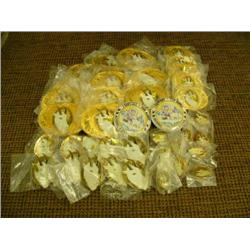 1989 Fur Rondy Memorabilia - 11 belt buckles, 5 lady's belt buckles, 7 collector's pins, 10 tie tack