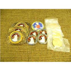 1982 Fur Rondy Memorabilia - 5 gold colored coins, 3 belt buckles, 4 collector's pins, 1 booster but