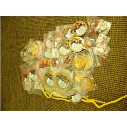 1985 Fur Rondy Memorabilia - 5 belt buckles, 4 coins, 1 lady's belt buckle, 5 tie tacks, 1 bolo tie,