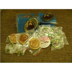 1992 Fur Rondy Memorabilia - 3 wood laser pins, 5 brass belt buckles, 9 collector's pins, 1 booster 