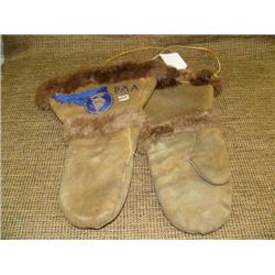 Pair of moose hide mittens, with beaded Pacific Alaska Airways Emblem, lined with otter min. bid $40