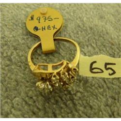 Approx .5K diamond and 4 smaller diamonds set in 14K gold (3)